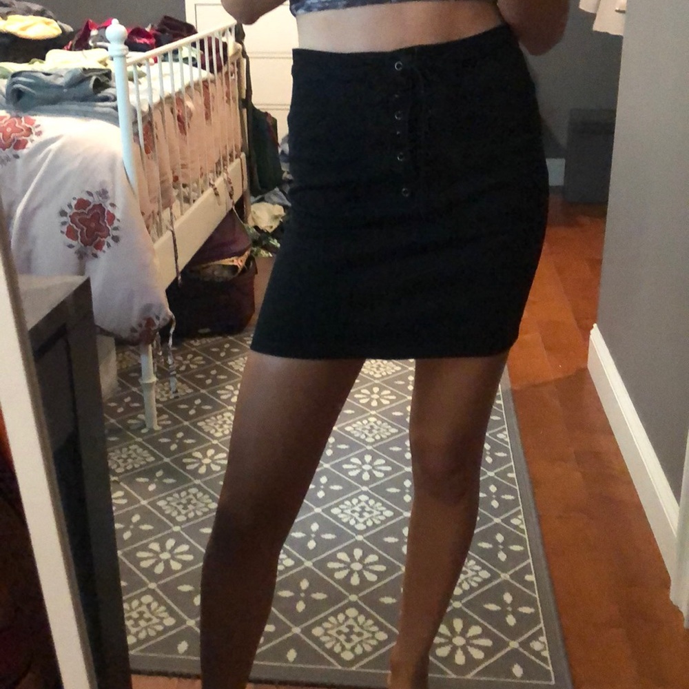 Never worn black lace up skirt!! Size M. Forever21